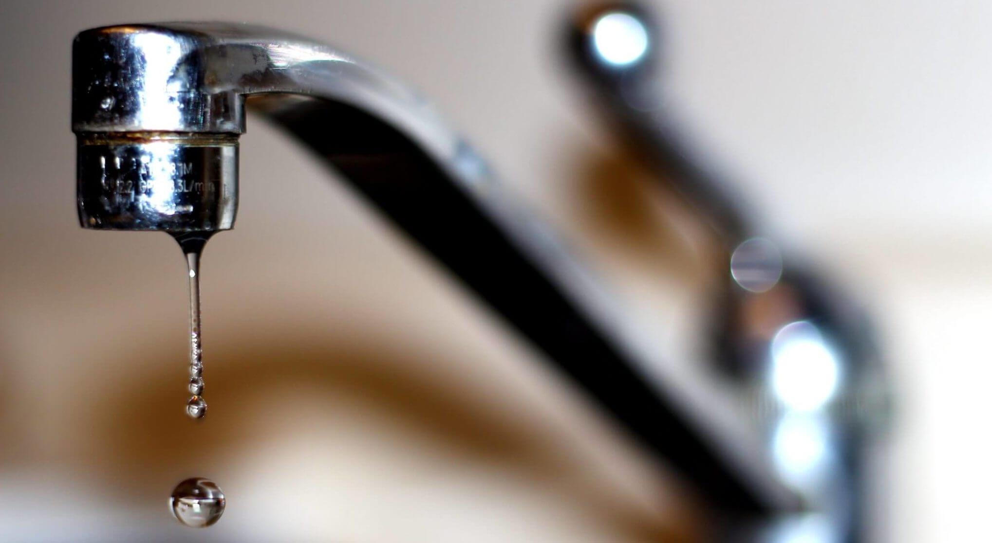 faucet is sputtering water from bathroom sink